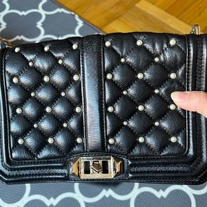 Used Rebecca Minkoff black leather bag. No dust bag.